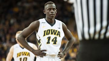 Feb 14, 2016; Iowa City, IA, USA; Iowa Hawkeyes guard Peter Jok (14) awaits to shoot a free throw against the Minnesota Golden Gophers during the first half at Carver-Hawkeye Arena. Mandatory Credit: Jeffrey Becker-USA TODAY Sports