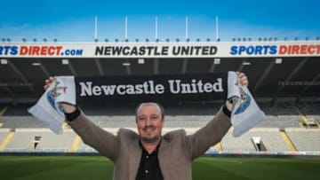 NEWCASTLE UPON TYNE, ENGLAND - MARCH 11: Rafael Benitez poses for photographs holding a club shirt pitch side after signing as Newcastle United's new manager at St.James' Park on March 11, 2016, in Newcastle upon Tyne, England. (Photo by Serena Taylor/Newcastle United via Getty Images)