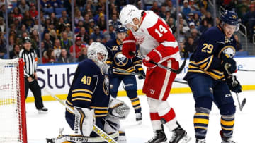 Nov 23, 2016; Buffalo, NY, USA; Detroit Red Wings right wing Gustav Nyquist (14) jumps to screen Buffalo Sabres goalie Robin Lehner (40) during the third period at KeyBank Center. Red Wings beat the Sabres 2-1 in a shootout. Mandatory Credit: Kevin Hoffman-USA TODAY Sports