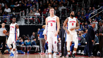 DETROIT, MI - MARCH 10: Reggie Jackson #1 Luke Kennard #5 and Andre Drummond #0 of the Detroit Pistons look on during the game against the Chicago Bulls on March 10, 2019 at Little Caesars Arena in Detroit, Michigan. NOTE TO USER: User expressly acknowledges and agrees that, by downloading and/or using this photograph, User is consenting to the terms and conditions of the Getty Images License Agreement. Mandatory Copyright Notice: Copyright 2019 NBAE (Photo by Brian Sevald/NBAE via Getty Images)