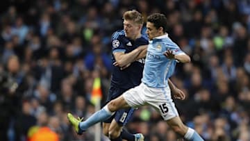 MANCHESTER, ENGLAND - APRIL 26: Toni Kroos of Real Madrid competes for the ball with Jesus Navas of Marchester City during the UEFA Champions League Semi Final first leg match between Manchester City FC and Real Madrid at the Etihad Stadium on April 26, 2016 in Manchester, United Kingdom. (Photo by Angel Martinez/Real Madrid via Getty Images)