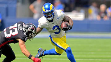 Sep 18, 2022; Inglewood, California, USA; Los Angeles Rams running back Cam Akers (3) carries the ball for a first down before he is forced out of bounds by Atlanta Falcons safety Erik Harris (23) in the first half at SoFi Stadium. Mandatory Credit: Jayne Kamin-Oncea-USA TODAY Sports
