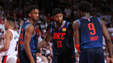 Terrance Ferguson, Paul George, Jerami Grant of OKC Thunder Game Five of Round One of the 2019 NBA Playoffs (Photo by Sam Forencich/NBAE via Getty Images)