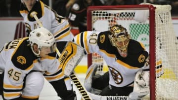 December 1, 2014; Anaheim, CA, USA; Boston Bruins goalie Tuukka Rask (40) and defenseman Joe Morrow (45) defend the goal against the Anaheim Ducks during the second period at Honda Center. Mandatory Credit: Gary A. Vasquez-USA TODAY Sports
