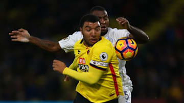 WATFORD, ENGLAND - NOVEMBER 19: Wes Morgan of Leicester City and Troy Deeney of Watford during the Premier League match between Watford and Leicester City at Vicarage Road on November 19, 2016 in Watford, England. (Photo by Catherine Ivill - AMA/Getty Images)