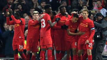 LIVERPOOL, ENGLAND - NOVEMBER 29: Divock Origi of Liverpool (C) celebrates with team mates as he scores their first goal during the EFL Cup Quarter-Final match between Liverpool and Leeds United at Anfield on November 29, 2016 in Liverpool, England. (Photo by Laurence Griffiths/Getty Images)