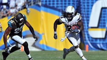 Sep 18, 2016; San Diego, CA, USA; San Diego Chargers running back Melvin Gordon (28) runs past Jacksonville Jaguars cornerback Jalen Ramsey (20) during the second half of the game at Qualcomm Stadium. San Diego won 38-14. Mandatory Credit: Orlando Ramirez-USA TODAY Sports