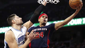 Dec 4, 2016; Auburn Hills, MI, USA; Detroit Pistons forward Tobias Harris (34) goes up for a shot against Orlando Magic center Nikola Vucevic (9) during the third quarter at The Palace of Auburn Hills. Magic win 98-92. Mandatory Credit: Raj Mehta-USA TODAY Sports