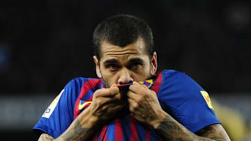 Barcelona's Brazilian defender Dani Alves celebrates after scoring his team's second goal during the second leg of the Spanish Cup quarter-final "El clasico" football match Barcelona vs Real Madrid at the Camp Nou stadium in Barcelona on January 25, 2012. AFP PHOTO/JAVIER SORIANO (Photo credit should read JAVIER SORIANO/AFP/Getty Images)