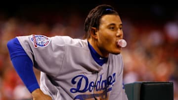 ST. LOUIS, MO - SEPTEMBER 14: Manny Machado #8 of the Los Angeles Dodgers looks on from the dugout during a game against the St. Louis Cardinals in the ninth inning at Busch Stadium on September 14, 2018 in St. Louis, Missouri. (Photo by Dilip Vishwanat/Getty Images)