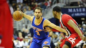 Mar 19, 2016; Washington, DC, USA; New York Knicks guard Jose Calderon (3) dribbles as Washington Wizards guard John Wall (2) defends during the first half at Verizon Center. Mandatory Credit: Brad Mills-USA TODAY Sports