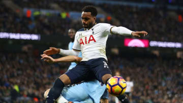 MANCHESTER, ENGLAND - JANUARY 21: Pablo Zabaleta of Manchester City (obscure) and Danny Rose of Tottenham Hotspur (R) battle for possession during the Premier League match between Manchester City and Tottenham Hotspur at the Etihad Stadium on January 21, 2017 in Manchester, England. (Photo by Clive Mason/Getty Images)