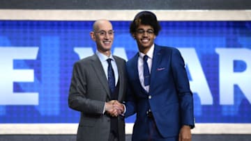 NEW YORK, NEW YORK - JUNE 20: Jordan Poole poses with NBA Commissioner Adam Silver after being drafted with the 28th overall pick by the Golden State Warriors during the 2019 NBA Draft at the Barclays Center on June 20, 2019 in the Brooklyn borough of New York City. NOTE TO USER: User expressly acknowledges and agrees that, by downloading and or using this photograph, User is consenting to the terms and conditions of the Getty Images License Agreement. (Photo by Sarah Stier/Getty Images)