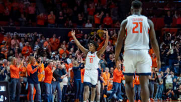 Mar 8, 2020; Champaign, Illinois, USA; Illinois Fighting Illini guard Ayo Dosunmu (11) celebrates after scoring during the second half against the Iowa Hawkeyes at State Farm Center. Mandatory Credit: Patrick Gorski-USA TODAY Sports
