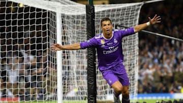 CARDIFF, WALES - JUNE 03: Cristiano Ronaldo of Real Madrid celebrates scoring his sides third goal during the UEFA Champions League Final between Juventus and Real Madrid at National Stadium of Wales on June 3, 2017 in Cardiff, Wales. (Photo by Matthias Hangst/Getty Images)