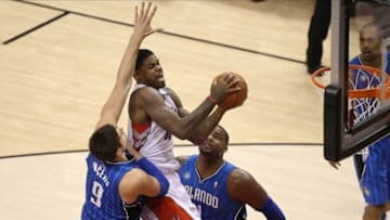 Jan 29, 2014; Toronto, Ontario, CAN; Toronto Raptors forward Amir Johnson (15) goes to the basket to score against the Orlando Magic at Air Canada Centre. Mandatory Credit: Tom Szczerbowski-USA TODAY Sports