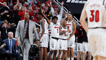 LOUISVILLE, KY - JANUARY 06: Assistant coach Mike Pegues of the Louisville Cardinals looks on as the bench reacts during the game against the Miami Hurricanes at KFC YUM! Center on January 6, 2019 in Louisville, Kentucky. Louisville won 90-73. (Photo by Joe Robbins/Getty Images)