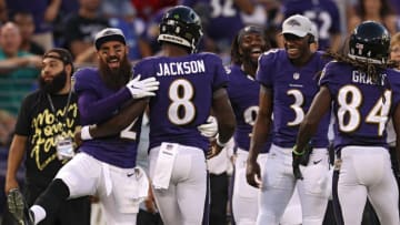 BALTIMORE, MD - AUGUST 09: Lamar Jackson #8 of the Baltimore Ravens celebrates with teammates after scoring a touchdown during the first quarter against the Los Angeles Rams during a preseason game at M&T Bank Stadium on August 9, 2018 in Baltimore, Maryland. (Photo by Patrick Smith/Getty Images)