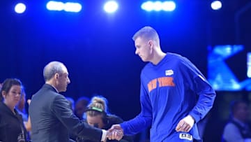 Feb 12, 2016; Toronto, Ontario, CAN; World player Kristaps Porzingis (6) shakes hands with World head coach Ettore Messina (L) prior to the Rising Stars Challenge basketball game against the U.S. at Air Canada Centre. Mandatory Credit: Bob Donnan-USA TODAY Sports