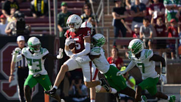 Auburn footballOct 2, 2021; Stanford, California, USA; Oregon Ducks cornerback DJ James (0) tackles Stanford Cardinal wide receiver John Humphreys (5) during the fourth quarter at Stanford Stadium. Mandatory Credit: Stan Szeto-USA TODAY Sports