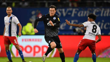HAMBURG, GERMANY - JANUARY 10: Jeremey Dudzaik of Hamburg challenges Michael Gregoritsch of Schalke during a friendly match between Hamburger SV and FC Schalke 04 at Volksparkstadion on January 10, 2020 in Hamburg, Germany. (Photo by Stuart Franklin/Bongarts/Getty Images)