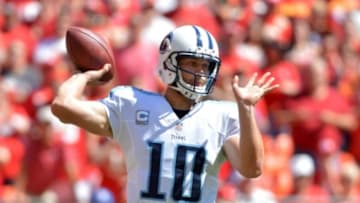 Sep 7, 2014; Kansas City, MO, USA; Tennessee Titans quarterback Jake Locker (10) throws a pass during the first half against the Kansas City Chiefs at Arrowhead Stadium. Mandatory Credit: Denny Medley-USA TODAY Sports