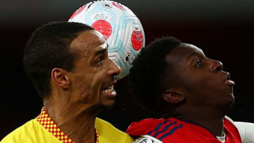 Liverpool's German-born Cameroonian defender Joel Matip (L) vies to header the ball against Arsenal's English striker Eddie Nketiah during the English Premier League football match between Arsenal and Liverpool at the Emirates Stadium in London on March 16, 2022. - - RESTRICTED TO EDITORIAL USE. No use with unauthorized audio, video, data, fixture lists, club/league logos or 'live' services. Online in-match use limited to 120 images. An additional 40 images may be used in extra time. No video emulation. Social media in-match use limited to 120 images. An additional 40 images may be used in extra time. No use in betting publications, games or single club/league/player publications. (Photo by Adrian DENNIS / AFP) / RESTRICTED TO EDITORIAL USE. No use with unauthorized audio, video, data, fixture lists, club/league logos or 'live' services. Online in-match use limited to 120 images. An additional 40 images may be used in extra time. No video emulation. Social media in-match use limited to 120 images. An additional 40 images may be used in extra time. No use in betting publications, games or single club/league/player publications. / RESTRICTED TO EDITORIAL USE. No use with unauthorized audio, video, data, fixture lists, club/league logos or 'live' services. Online in-match use limited to 120 images. An additional 40 images may be used in extra time. No video emulation. Social media in-match use limited to 120 images. An additional 40 images may be used in extra time. No use in betting publications, games or single club/league/player publications. (Photo by ADRIAN DENNIS/AFP via Getty Images)