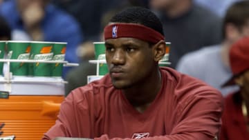 WASHINGTON, DC - NOVEMBER 19 : LeBron James #23 of the Cleveland Cavaliers sits on the bench during the game against the Washington Wizards on November 19, 2003 at the MCI Center in Washington DC. NOTE TO USER: User expressly acknowledges and agrees that, by downloading and or using this photograph, User is consenting to the terms and conditions of the Getty Images License Agreement. (Photo by G Fiume/Getty Images)