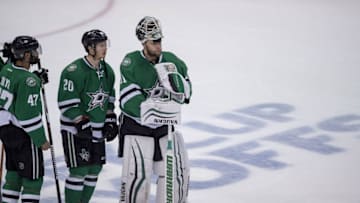 May 11, 2016; Dallas, TX, USA; Dallas Stars defenseman Johnny Oduya (47), center Cody Eakin (20), and goalie Antti Niemi (31) watch the St. Louis Blues players celebrate after winning game seven of the second round of the 2016 Stanley Cup Playoffs at American Airlines Center. The Blues won 6-1. Mandatory Credit: Jerome Miron-USA TODAY Sports