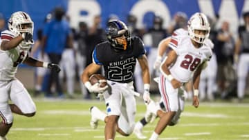 Auburn footballMontgomery Catholic's Jeremiah Cobb (23) runs the ball at Cramton Bowl in Montgomery, Ala., on Friday, Nov. 25, 2022. Andalusia leads Montgomery Catholic 22-19 at halftime.