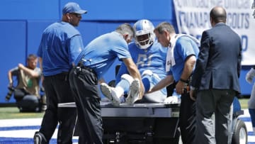 INDIANAPOLIS, IN - AUGUST 13: Kerry Hyder #61 of the Detroit Lions is taken off the field after suffering an injury against the Indianapolis Colts during a preseason game at Lucas Oil Stadium on August 13, 2017 in Indianapolis, Indiana. (Photo by Joe Robbins/Getty Images)