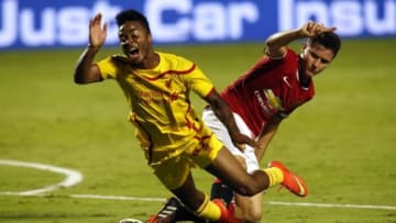 Aug 4, 2014; Miami Gardens, FL, USA; Liverpool midfielder Raheem Sterling (31) is defended by Manchester United player Ander Herrera in the first half at Sun Life Stadium. Mandatory Credit: Robert Mayer-USA TODAY Sports