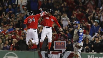 Sep 30, 2016; Boston, MA, USA; Boston Red Sox designated hitter David Ortiz (34) celebrates his two run home run with right fielder Mookie Betts (50) against the Toronto Blue Jays in the seventh inning at Fenway Park. Mandatory Credit: David Butler II-USA TODAY Sports