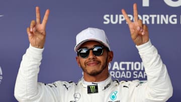 AUSTIN, TX - OCTOBER 21: Pole position qualifier Lewis Hamilton of Great Britain and Mercedes GP celebrates in parc ferme during qualifying for the United States Formula One Grand Prix at Circuit of The Americas on October 21, 2017 in Austin, Texas. (Photo by Mark Thompson/Getty Images)