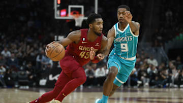 Nov 18, 2022; Cleveland, Ohio, USA; Cleveland Cavaliers guard Donovan Mitchell (45) drives to the basket against Charlotte Hornets guard Theo Maledon (9) during the second half at Rocket Mortgage FieldHouse. Mandatory Credit: Ken Blaze-USA TODAY Sports