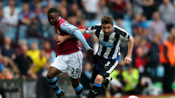 BIRMINGHAM, ENGLAND - MAY 07: Paul Dummett of Newcastle United and Rushian Hepburn-Murphy of Aston Villa compete for the ball during the Barclays Premier League match between Aston Villa and Newcastle United at Villa Park on May 7, 2016 in Birmingham, United Kingdom. (Photo by Richard Heathcote/Getty Images)