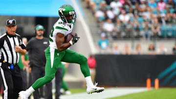 JACKSONVILLE, FLORIDA - OCTOBER 27: Jamison Crowder #82 of the New York Jets catches a 5-yard pass thrown by Sam Darnold #14 in the first quarter of a football game against the Jacksonville Jaguars at TIAA Bank Field on October 27, 2019 in Jacksonville, Florida. (Photo by Julio Aguilar/Getty Images)