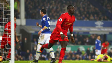 LIVERPOOL, ENGLAND - DECEMBER 19: Sadio Mane of Liverpool celebrates as he scores their first goal during the Premier League match between Everton and Liverpool at Goodison Park on December 19, 2016 in Liverpool, England. (Photo by Clive Brunskill/Getty Images)