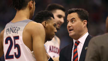 SALT LAKE CITY, UT - MARCH 18: Head coach Sean Miller speaks with Keanu Pinder
