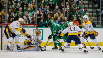 DALLAS, TX - DECEMBER 05: Nashville Predators goalie Juuse Saros (74) blocks a shot from Dallas Stars right wing Alexander Radulov (47) with help from defenseman Mattias Ekholm (14) and left wing Viktor Arvidsson (33) during the game between the Dallas Stars and the Nashville Predators on Tuesday 05, 2017 at the American Airlines Center in Dallas, Texas. Nashville beats Dallas 5-2. (Photo by Matthew Pearce/Icon Sportswire via Getty Images)