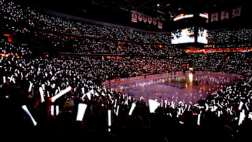 WASHINGTON, DC - JUNE 04: Fans wave their lights prior to Game Four of the 2018 NHL Stanley Cup Final between the Washington Capitals and the Vegas Golden Knights at Capital One Arena on June 4, 2018 in Washington, DC. (Photo by Avi Gerver/Getty Images)