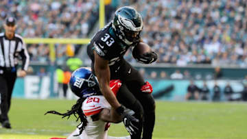 PHILADELPHIA, PA - NOVEMBER 25: Running back Josh Adams #33 of the Philadelphia Eagles is tackled by cornerback Janoris Jenkins #20 of the New York Giants during the third quarter at Lincoln Financial Field on November 25, 2018 in Philadelphia, Pennsylvania. The Philadelphia Eagles won 25-22. (Photo by Elsa/Getty Images)