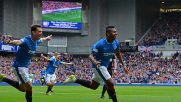GLASGOW, SCOTLAND - AUGUST 12: Alfredo Morelos of Rangers celebrates scoring the opening goal of the game with his team mates during the Ladbrokes Scottish Premiership match between Rangers and Hibernian at Ibrox Stadium on August 12, 2017 in Glasgow, Scotland. (Photo by Mark Runnacles/Getty Images)