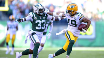 EAST RUTHERFORD, NJ - DECEMBER 23: Equanimeous St. Brown #19 of the Green Bay Packers stiff arms Jamal Adams #33 of the New York Jets during the second quarter at MetLife Stadium on December 23, 2018 in East Rutherford, New Jersey. (Photo by Sarah Stier/Getty Images)