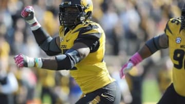 Oct 19, 2013; Columbia, MO, USA; Missouri Tigers defensive lineman Michael Sam (52) celebrates after sacking Florida Gators quarterback Tyler Murphy (3) (not pictured) during the second half at Faurot Field. Missouri won 36-17. Mandatory Credit: Denny Medley-USA TODAY Sports