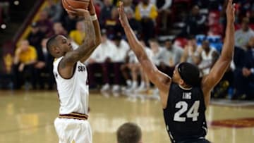 Jan 5, 2017; Tempe, AZ, USA; Arizona State Sun Devils guard Torian Graham (4) shoots over Colorado Buffaloes guard George King (24) during the first half at Wells-Fargo Arena. Mandatory Credit: Joe Camporeale-USA TODAY Sports