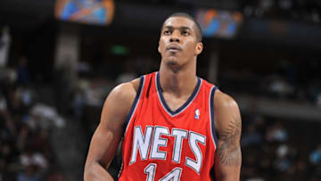 DENVER - NOVEMBER 20 Derrick Favors #14 of the New Jersey Nets prepares to shoot a free throw during the game against the Denver Nuggets on November 20, 2010 at the Pepsi Center in Denver, Colorado. Copyright 2010 NBAE (Photo by Garrett W. Ellwood/NBAE via Getty Images)