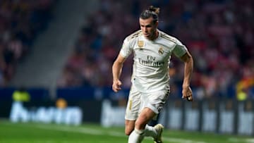 MADRID, SPAIN - SEPTEMBER 28: Gareth Bale of Real Madrid runs with the ball during the Liga match between Club Atletico de Madrid and Real Madrid CF at Wanda Metropolitano on September 28, 2019 in Madrid, Spain. (Photo by Quality Sport Images/Getty Images)