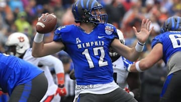 Dec 30, 2015; Birmingham, AL, USA; Memphis Tigers quarterback Paxton Lynch (12) drops back to pass against Auburn Tigers in the 2015 Birmingham Bowl at Legion Field. Mandatory Credit: Marvin Gentry-USA TODAY Sports