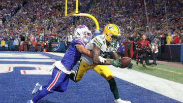 Packers receiver Romeo Doubs catches a 19 yards touchdown pass as he beats the tight coverage by Bills safety Damar Hamlin.Ag3i6467